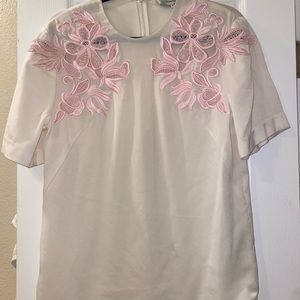 beautiful phillip lim cream blouse with light pink detail.